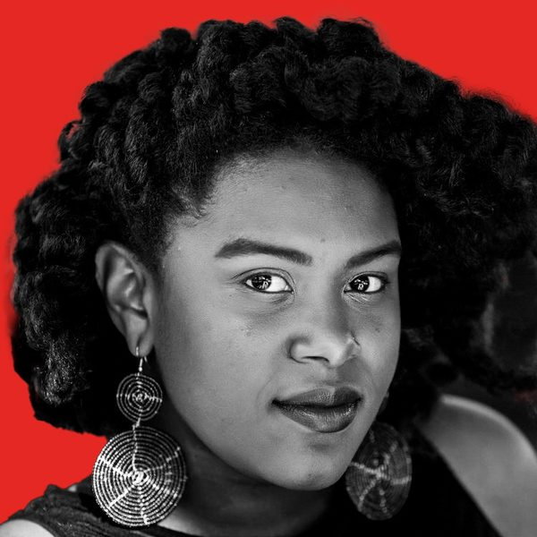 Mya in black and white in front of a red background
